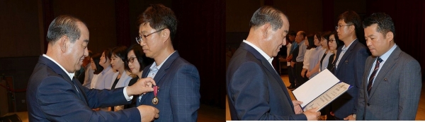지난 5일 모범공무원 표창을 받은 예산군 김영은(왼쪽) 주무관과 김상혁 주무관(오른쪽)